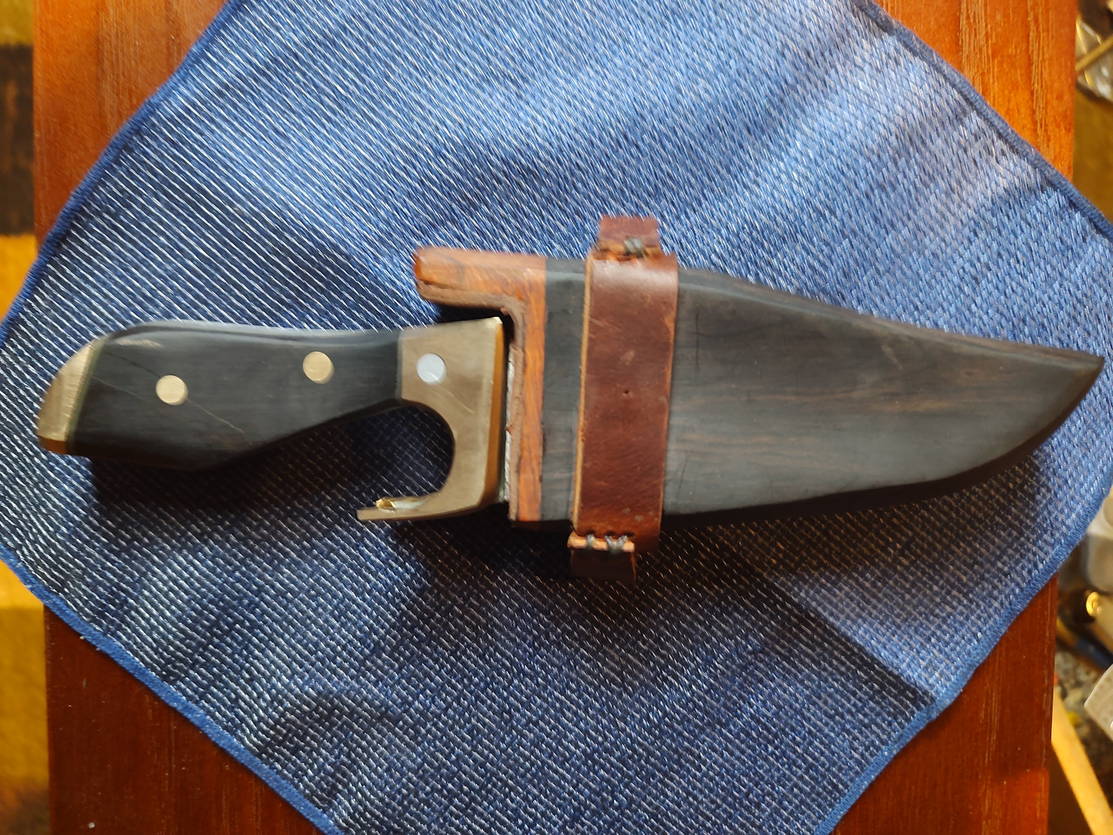 Hunting knife with leather sheath