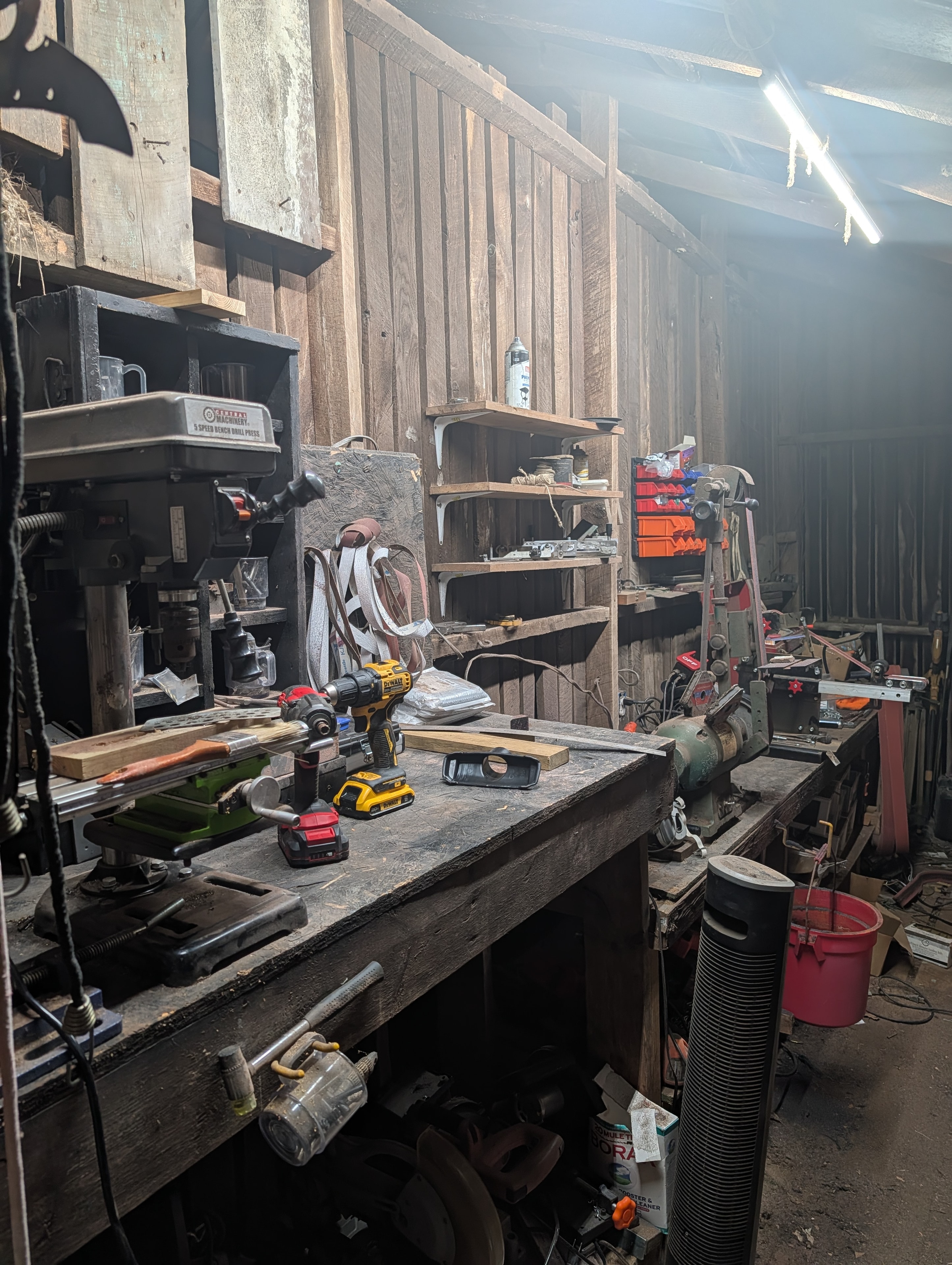 Bsharp Blacksmith workshop — workbench with drill press and power tools