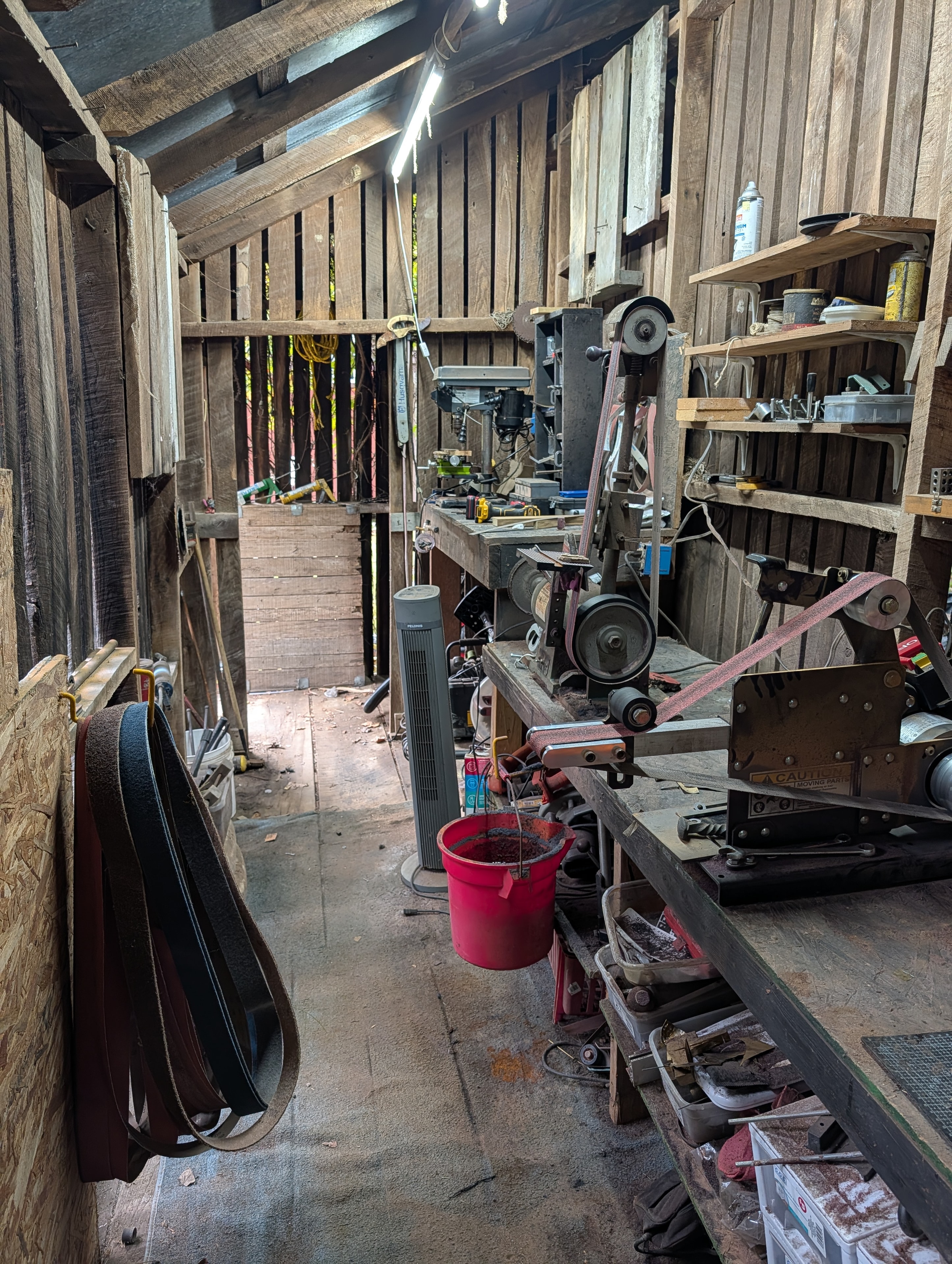 Bsharp Blacksmith workshop — belt grinder station and tools