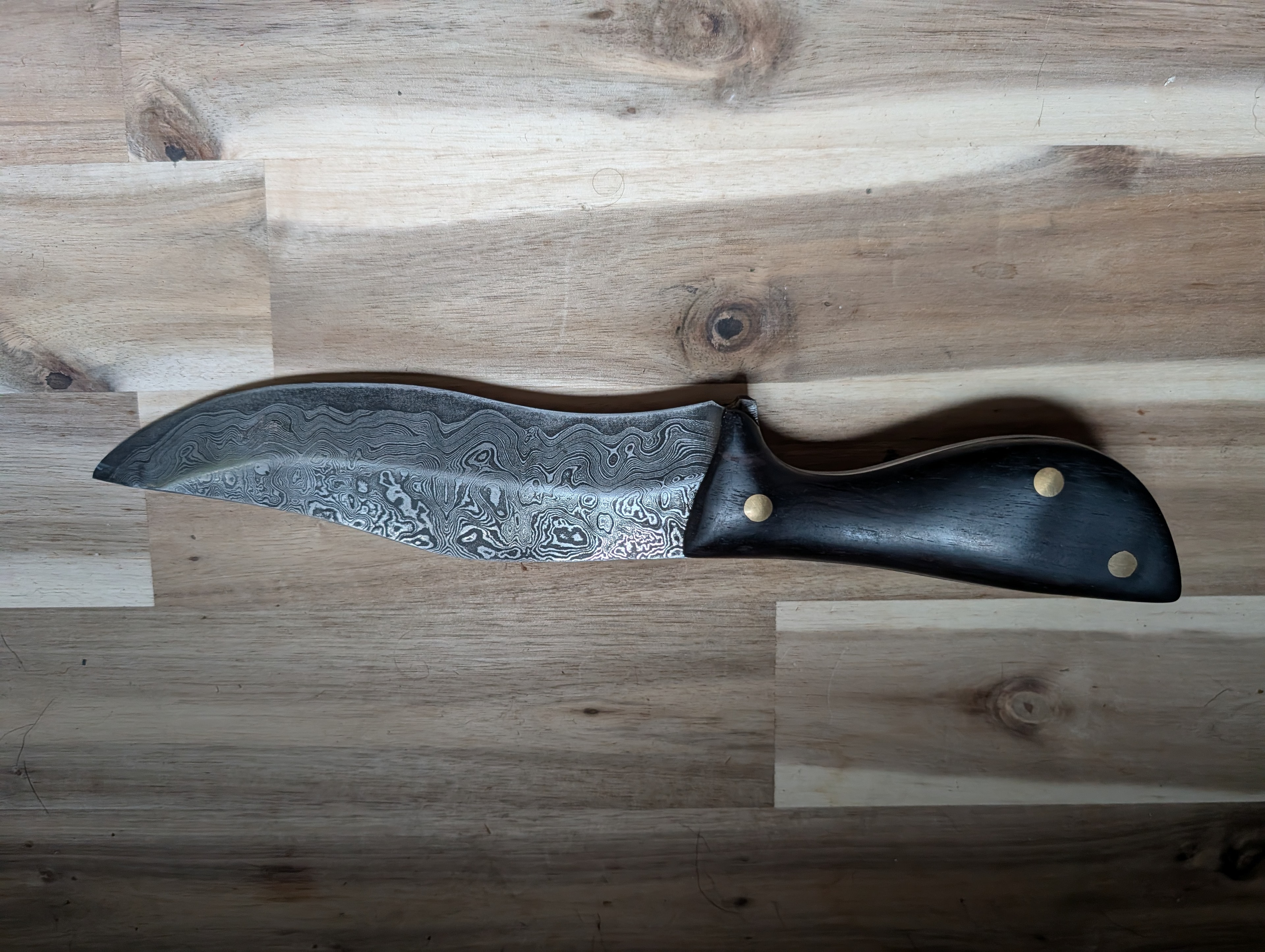 Damascus chef knife with laminated wood handle